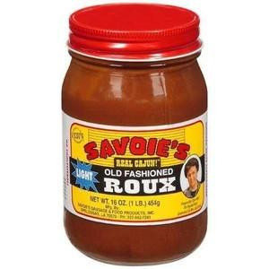 Savoies Light Roux 16oz, jar of light roux sauce with red lid and colorful label showing product details and brand name.