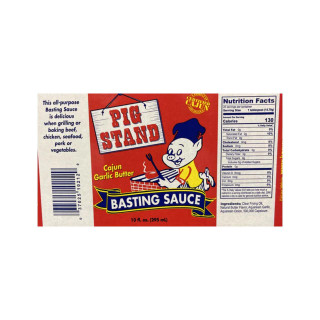 Kary's Roux Pig Stand Garlic Butter Basting Sauce 10oz, a red and white bottle label featuring cartoon pig mascot grilling, with nutritional facts and ingredients on the side.