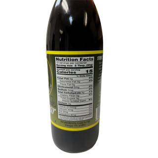 Steen's Pure Cane Vinegar 12oz, dark glass bottle with nutrition facts and ingredients label.