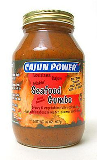 Cajun Power Seafood Gumbo Base 32oz jar, thick and flavorful seafood gumbo base with a golden lid and bright label featuring seafood images.