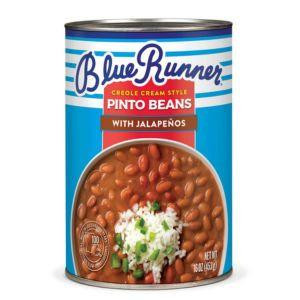 Blue Runner Creole Cream Style Pinto Beans with Jalapenos, 16oz can of beans featuring an image of cream-style pinto beans with jalapenos and a garnish of chopped green onions.
