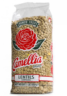 Camellia Lentils 1lb, a clear plastic bag filled with small, light beige lentils with a label featuring a red rose and green leaves.