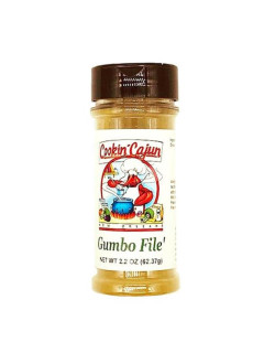 Cookin' Cajun Gumbo File, 2.2oz bottle of seasoning with a white label and brown cap, featuring an illustrated chef and gumbo pot.
