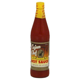 Cajun Chef Louisiana Hot Sauce 6oz, a bottle of spicy hot sauce with a yellow cap and label, featuring a Cajun chef illustration and bold red and yellow text.