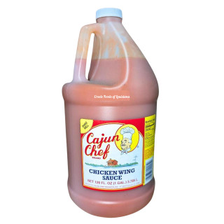 Cajun Chef Wing Sauce 128oz, a large plastic jug of spicy chicken wing sauce with a red and white label featuring a chef's illustration and nutritional information.