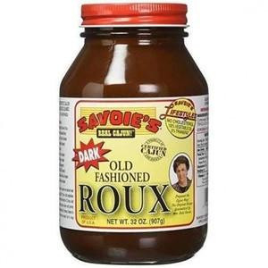 Savoies Dark Roux 32oz 2 Pack, glass jar of dark roux with a red lid and yellow label displaying product details.
