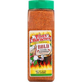 Tony Chachere's Bold Creole Seasoning 30oz, a clear plastic bottle filled with vibrant red spice blend and a green lid, featuring a colorful label with a chef mascot and flames design.