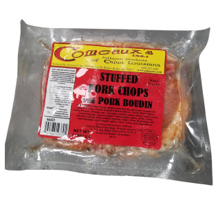 Comeaux's Stuffed Pork Chops with Boudin, packaged in vacuum-sealed plastic, showing the label with product details and cooking instructions.