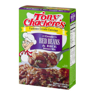 Tony Chachere's Red Beans & Rice Dinner Mix 7oz, a box featuring a cartoon chef and an image of prepared red beans and rice on the front.
