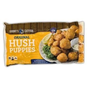 Guidrys Original Flavor Hushpuppies 1lb, packaged frozen hush puppies with a plate of seasoned hush puppies served with lemon and parsley on the packaging.