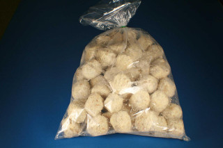 Cajun Original Alligator Boudin Balls 12lb, image showing a large transparent bag filled with 144 breaded alligator boudin balls on a blue surface.