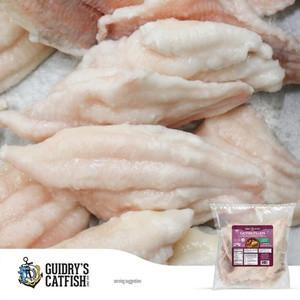 Guidrys Catfish Fillets 3-7oz 2lb, fresh catfish fillets ready for cooking, packaged in a 2-pound bag for easy preparation.
