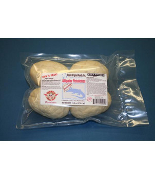 Cajun Original Alligator Pistolettes 4 Pack, frozen alligator meat pouches in clear plastic packaging with label and barcode.