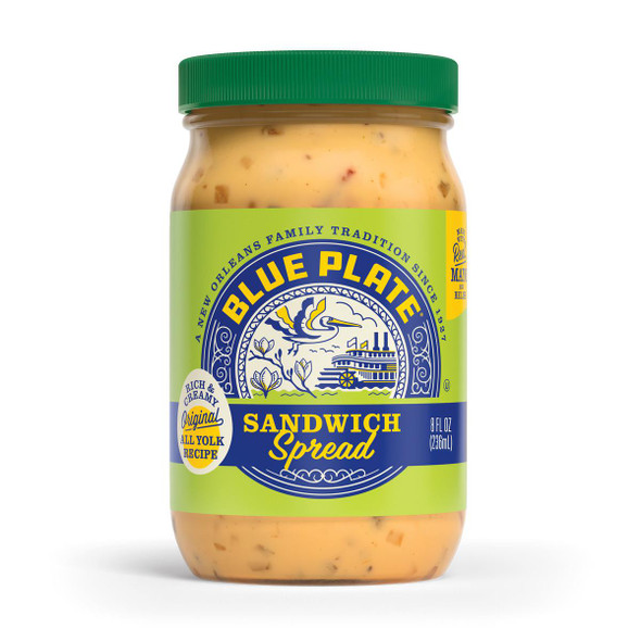 Blue Plate Sandwich Spread 8 oz, jar of creamy yellow sandwich spread with visible spices and herbs, green lid, and colorful label.