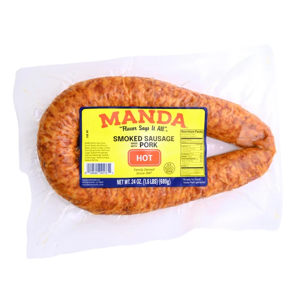 Manda Hot Smoked Pork Sausage, 24oz package of smoked pork sausage in vacuum-sealed plastic wrapping with yellow label.