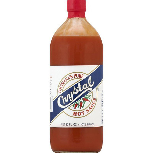 Crystal Hot Sauce 32oz, a large bottle of Louisiana's pure hot sauce with a red cap and label showing chili peppers.