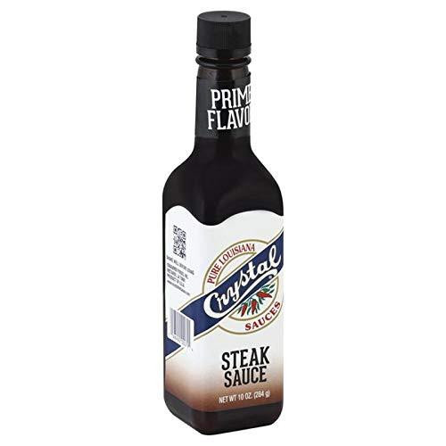 Crystal Steak Sauce 10oz, a dark glass bottle of steak sauce with a white and navy label featuring the Crystal logo and description of the product.