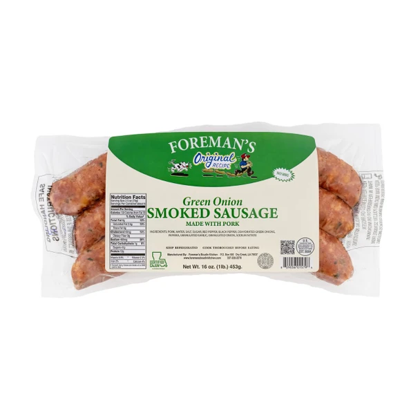 Foreman's Smoked Green Onion Sausage 1lb, packaged pork sausage with visible green onion pieces, in clear plastic wrapping with green and white label.