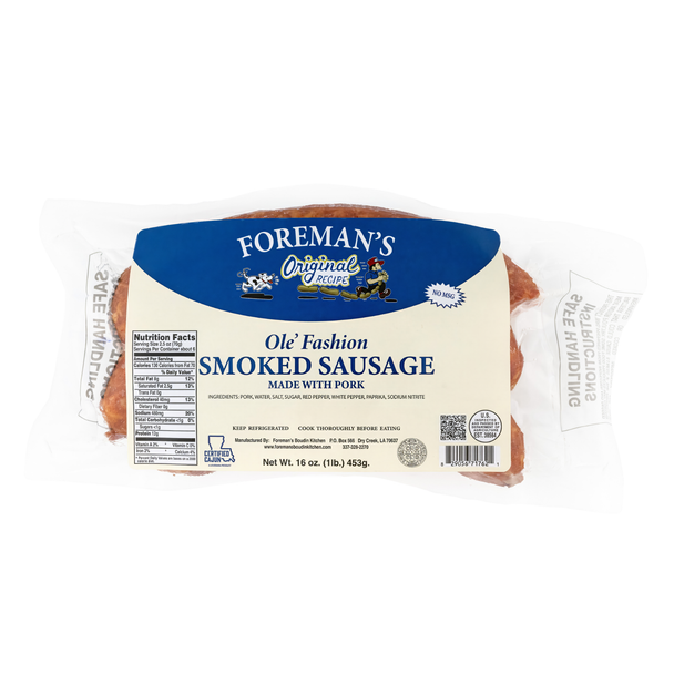 Foreman's Ole' Fashion Smoked Sausage 1lb, packaged smoked sausage with a visible charred exterior and a slightly rough surface.