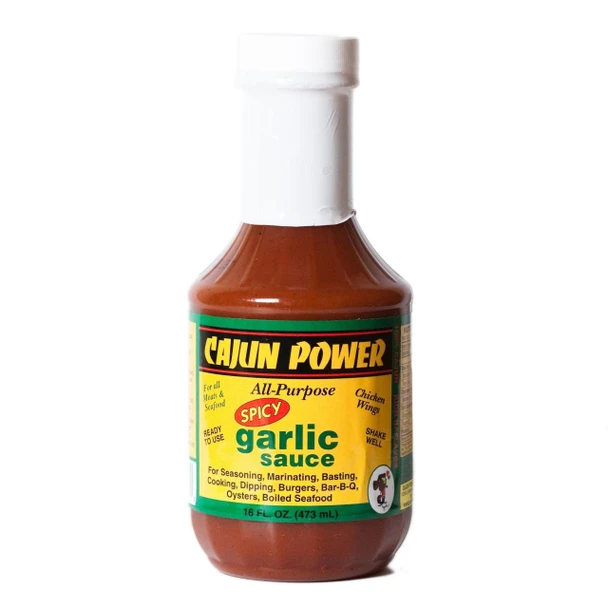 Cajun Power Spicy Garlic Sauce 16oz, bottle of spicy garlic sauce with a white cap and colorful label featuring product details.