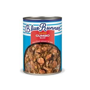 Blue Runner Cajun Gumbo Base 25oz, cannedgumbo base with a label and visible chunks of meat and vegetables inside.