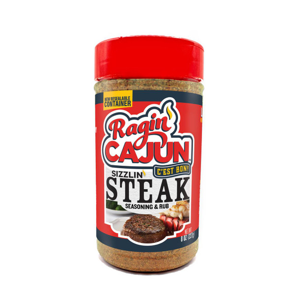 Ragin Cajun 8oz Sizzlin' Steak Cajun Seasoning & Rub, bottle of spice seasoning with red cap and label showing cooked steak and seafood, for flavorful grilling and cooking.