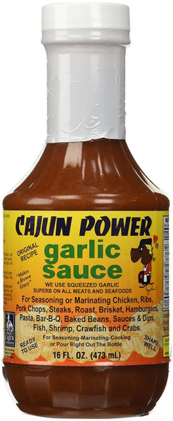Cajun Power Garlic Sauce 16oz, bottle of savory garlic sauce with a yellow label and black and green text, featuring an illustration of a dog and used for seasoning or marinating various meats and seafoods.