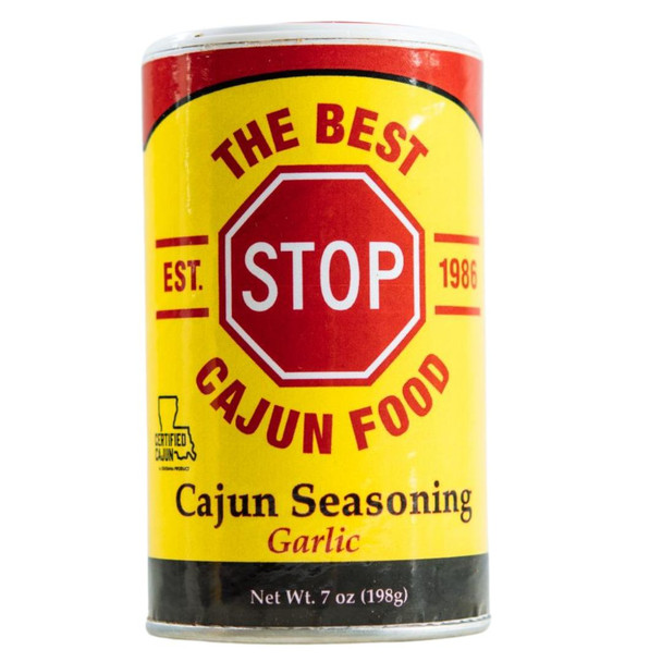 The Best Stop Garlic Cajun Seasoning 7oz, yellow and red spice container with a stop sign label and black bottom, featuring text about Cajun seasoning and garlic for flavorful cooking.