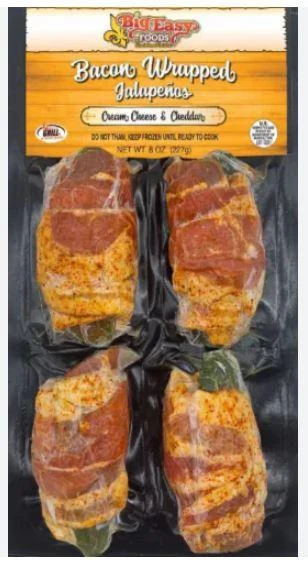 Big Easy Foods Bacon Wrapped Stuffed Jalapenos Cream Cheese & Cheddar 4 Pack, image of four bacon-wrapped jalapeno peppers filled with cream cheese and cheddar cheese