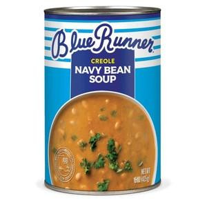 Blue Runner Navy Bean Soup 15oz, can of creamy navy bean soup with parsley garnishing on top.