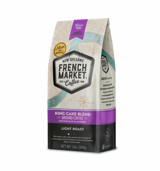 French Market Coffee Flavored King Cake Blend 12 oz, packaging of ground coffee with a nautical theme and purple label indicating light roast flavor.