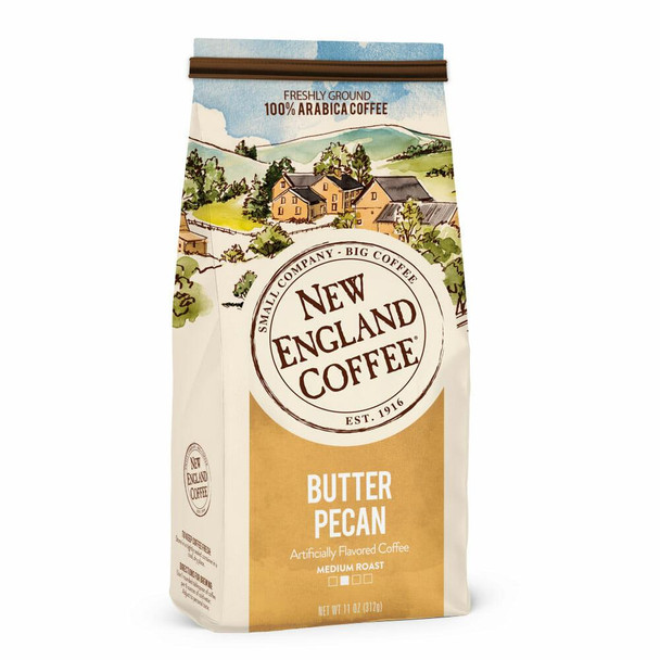 New England Coffee Butter Pecan Ground Coffee, 11 oz, artfully flavored medium roast with a picturesque landscape illustration on the packaging.