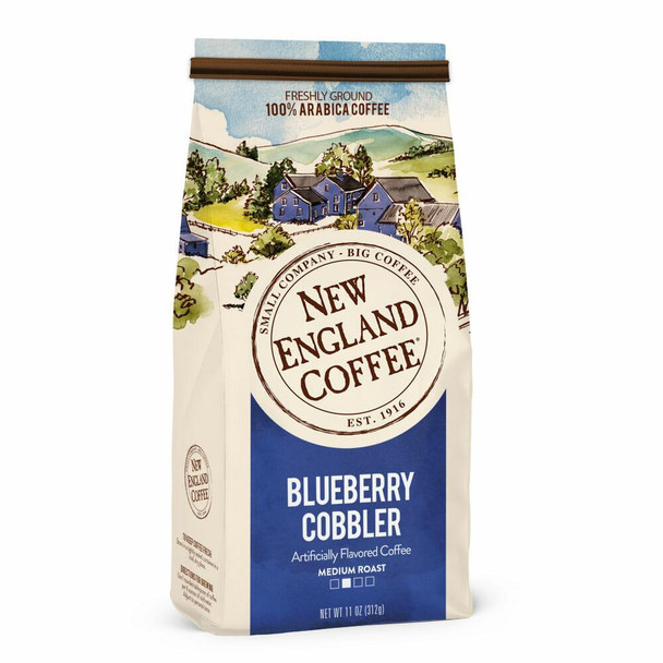 New England Coffee Blueberry Cobbler Ground 11 oz, package of artificially flavored coffee with a scenic illustration of a countryside and houses.