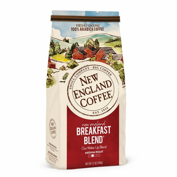 New England Coffee Breakfast Blend Ground 12 oz, a bag of medium roast coffee with colorful, illustrated packaging showing a rural landscape and the New England Coffee logo.