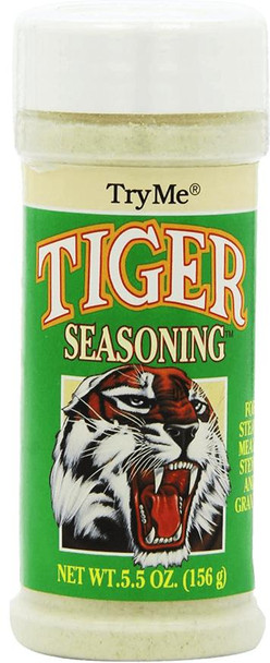 Try Me Tiger Seasoning 5.5 oz, a green container with a white lid featuring a fierce tiger illustration and bold red and yellow text.