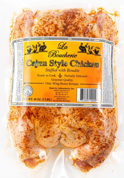 La Boucherie Boudin Stuffed Cajun Style Chicken 3 lb, raw seasoned chicken, stuffed with boudin sausage, in vacuum sealed packaging.