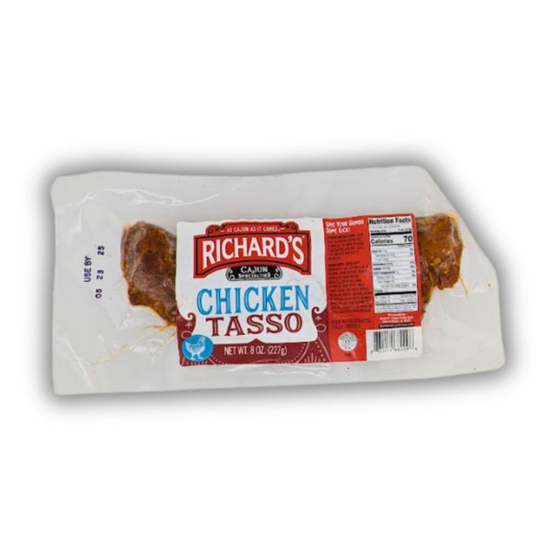 Richards Chicken Tasso, packaged smoked seasoned chicken meat in clear plastic wrapping with red and white label.