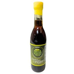 Steen's Pure Cane Vinegar 12oz, a glass bottle with a yellow cap and a label featuring lime imagery and product details.