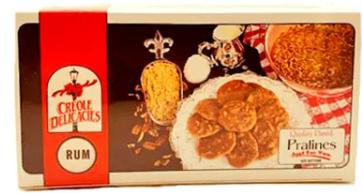 Creole Delicacies Rum Praline, image of the product box featuring pralines coated in caramel and nuts with a label indicating rum flavor.