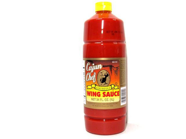 Cajun Chef Wing Sauce 34oz, red plastic bottle with yellow cap and label featuring Louisiana theme and logo, designed for flavorful wing flavor.