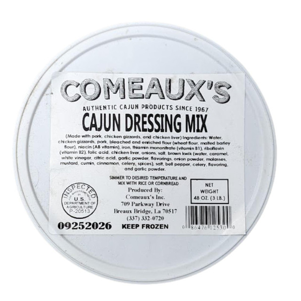 Comeaux's Rice Dressing Mix 3lb, in a round container with a white label featuring product information and ingredients.