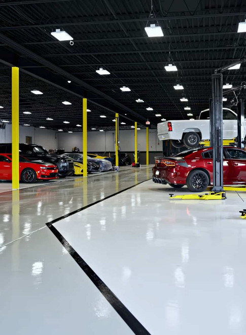 Industrial Epoxy Floor In High Performance Race Shop