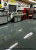 Charcoal Gray Epoxy Flooring With Black Medium Gray Dark Gray Flakes and Military Grade Topcoat
