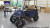 Garage Floor Epoxy In Pole Bard With Primer & Military Topcoat. Medium Gray - Black, White & Primary Blue Flakes.