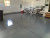 Garage Epoxy Floor Without The Color Flakes- Charcoal Gray. Notice How The Unfilled Saw Cuts Ad Dimension To The Floor!