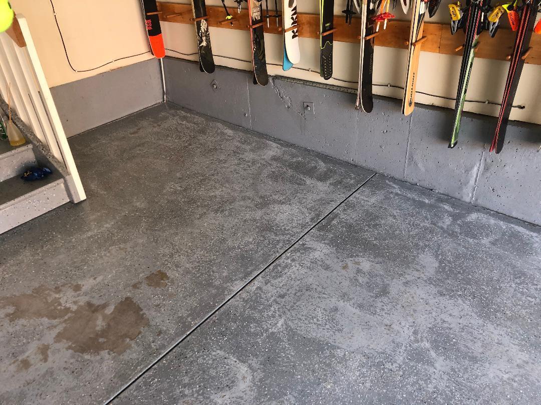 Damaged Garage Floor Before ArmorGarage Epoxy Flooring