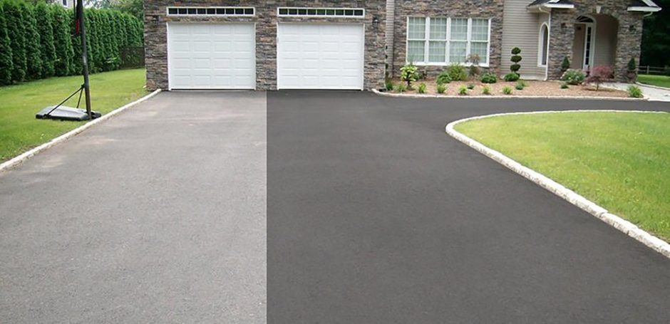 Surface Bond Coating In Black Being Applied To Large Driveway