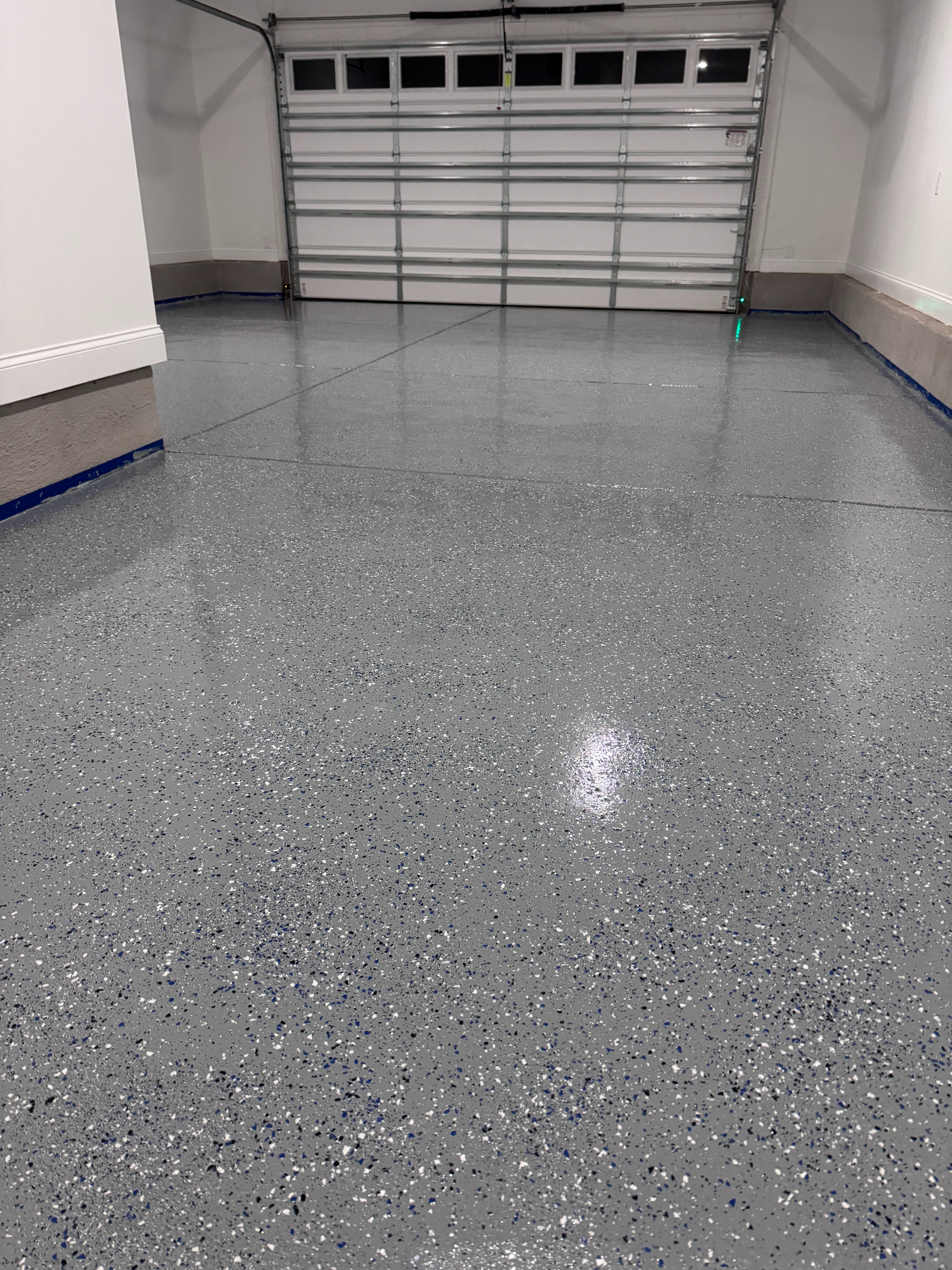 Garage Floor With Dark Gray Epoxy And Color Flakes
