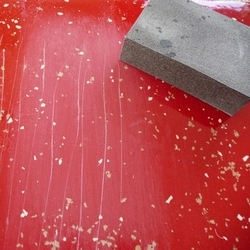 How to remove scratches from and epoxy floor coating