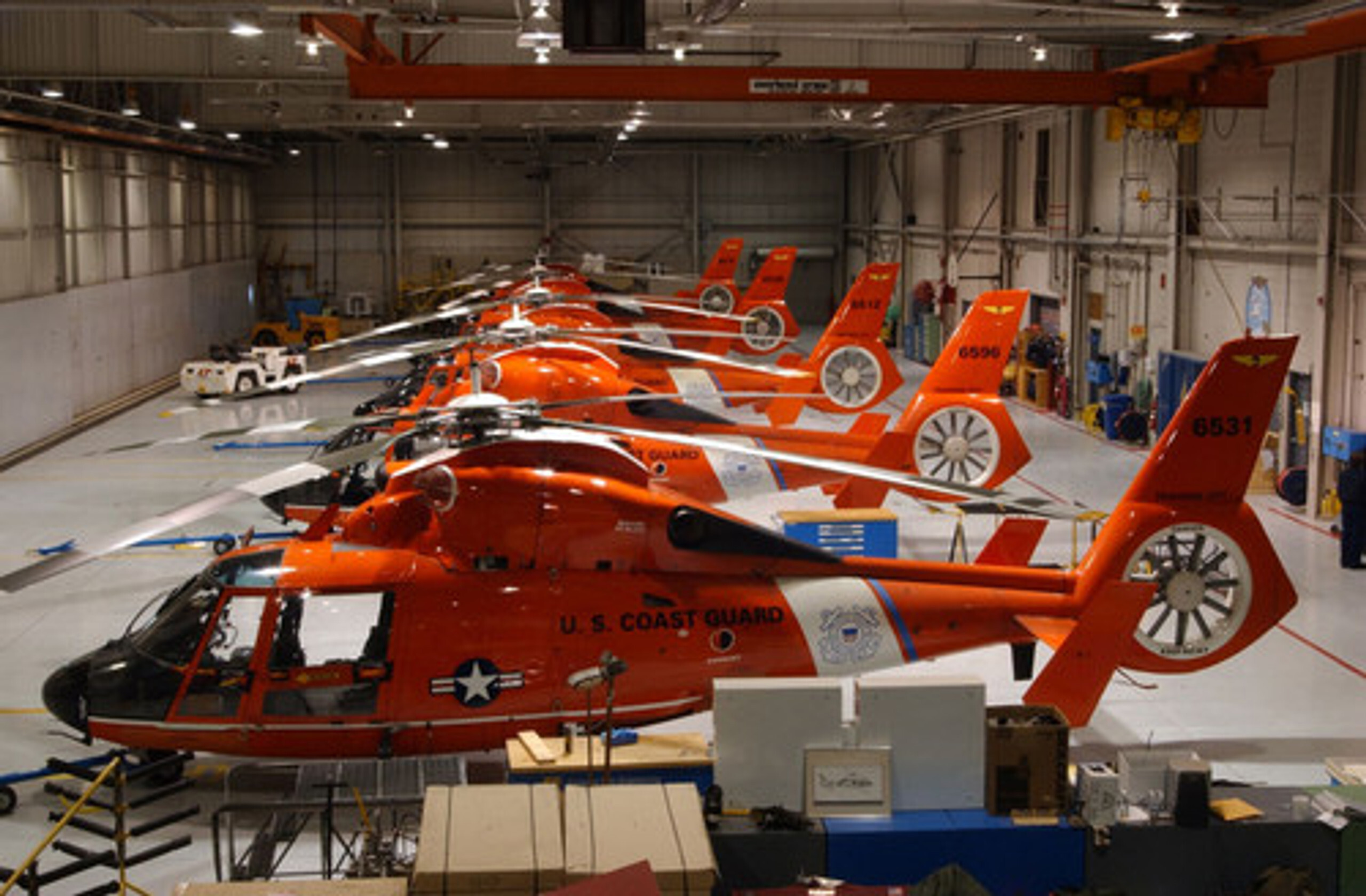 U.S. Coast Guard hangar with dark gray commercial epoxy floor